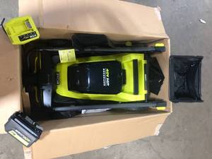 lot 11 image: RYOBI 40V HP Brushless 20 in. Cordless Electric Battery Walk Behind Self-Propelled Mower with 6.0 Ah Battery and Charger Customer Returns See Pictures