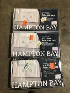 lot 24 image: Lot of Hampton Bay 9 in. Twin Window Fan   Customer Returns See Pictures