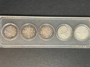 5 SILVER CANADIAN QUARTERS INCLUDING 1874 IN HARDCOVER CASE