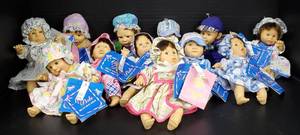 lot 116 image: Lot of 12 My Pals Plush Expression Baby Dolls
