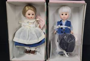 lot 69 image: Two madame Alexander Wizard of Oz Dolls - 39910 Auntie Em and 39915 Uncle Henry NRFB