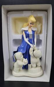 lot 73 image: Department 56 Snowbabies Under the Midnight Moon with Barbie Figurine