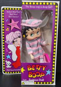 lot 94 image: Betty Boop Fashion Doll Pink and Winter Woolens Gray Stripe Outfit 1986