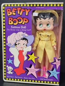 lot 95 image: Betty Boop Fashion Doll NIB Yellow Trench Coat