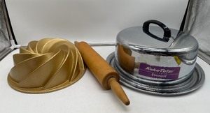 lot 28 image: Chrome Cake Plate, Nordic Ware Bundt Pan, Rolling Pin