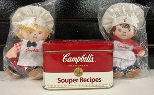 lot 53 image: Two Campbells Dolls and Souper Recipes Tin Box