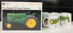 lot 54 image: Metal John Deere Model 70 Toy Tractor and 4 John Deer Mugs