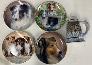 lot 78 image: Two Dog Display Plates and Wolf Mug