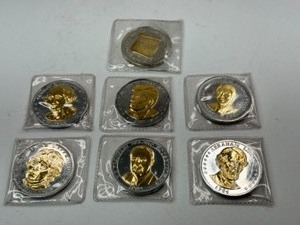 Four Silver Plated and Gold Highlighted Medallions