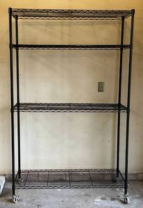 lot 13 image: 48 L  x 77 T x 18 W Metal Rolling Shelves