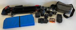 lot 84 image: Vintage Minolta XG-1  Camera Body With Lenses & More