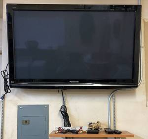 lot 128 image: Panasonic 42 Plasma TV With Remote, Roku & Extras (Works) No Stand (No Wall Mount Included)