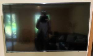 lot 147 image: 50 Samsung Smart Tv With Remote (Barely Used) With No Stand (Wall Mount Not Included)