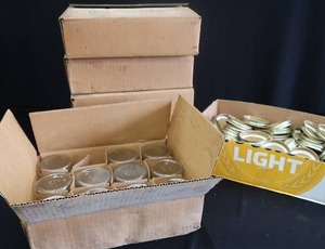 lot 27 image: CANNING JARS AND LIDS