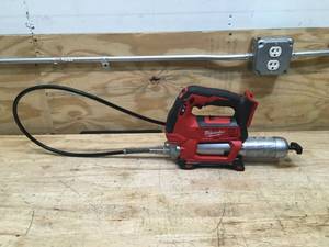 lot 85 image: Milwaukee M18 Cordless 2-Speed Grease Gun Model # 2646-20 (Tool Only)