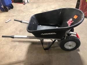 lot 5 image: Husky 6 cu. ft. Poly Dual FF Wheelbarrow   Customer Returns See Pictures