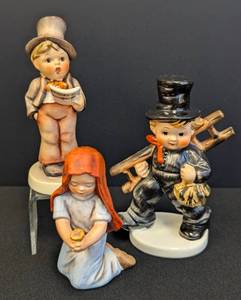 lot 54 image: Three Porcelain Hummel Figurines