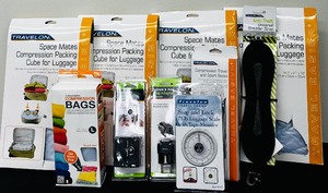 lot 134 image: New Travelon and Smooth Trip Items including Compression Bags, Luggage Scale, International Adapter Cube, Anti Theft Universal Should Strap and More