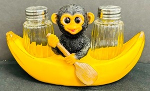 lot 146 image: Baby Monkey in Banana Boat Salt and Pepper Shaker Holder
