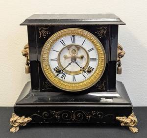lot 122 image: Antique Waterbury Iron Lion Handled Mantle Clock