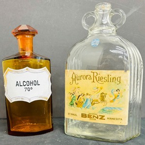 lot 189A image: Vintage Amber Glass Alcohol Apothecary Bottle and Vintage Aurora Riesling Glass Bottle