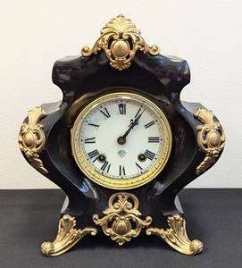 lot 105 image: Antique Ansonia Monaco Iron Mantle Clock