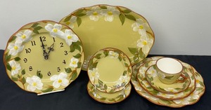 lot 87B image: Vintage Stangl Pottery Hand Painted White Dogwood Dishes includes a Vintage Stangl Pottery Dogwood Wall Clock