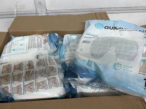 lot 59 image: MSRP $300  1 Case (100 each per case) NEW Quick Change 10-Pack Urine Incontinence Management Wraps
