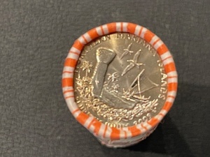 lot 19 image: Unopened 2009 Quarters Roll