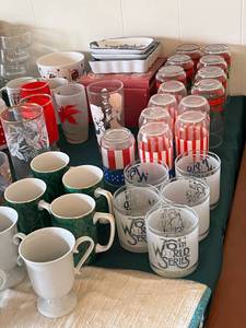 lot 10 image: Huge Lot of Glassware including Vintage Pringles Potato Chips Drinking Glasses, Ruby Red Glassware, 76th World Series Glasses, and More