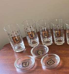 lot 81 image: Vintage MCM Glass Tumblers including Farmers & Mechanics Savings Bank of Minneapolis Libbey Safedge Glassware w Precious Metal Decorations