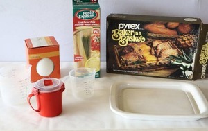 lot 821 image: Pyrex Pan Basket, Measuring Cups Etc