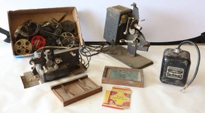 lot 737 image: Antique Movie Projector, Master Vibrator Ignition Transformer Etc