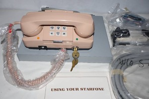 lot 933 image: Vintage Starphone wKey