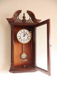 lot 948 image: Vintage Howard Miller Pendulum Wall Mount Clock wKey