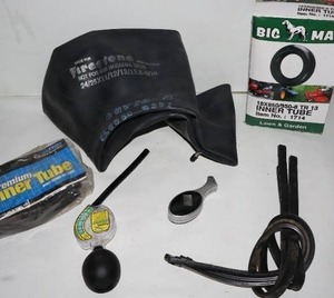 lot 965A image: Big Max Firestone Inner Tube Auto Gauges Etc