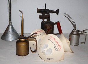 lot 101 image: Vintage Brass Blow Torch, Oil Cans, Funnel and St. Cloud Auto Supply Advertising Paper Funnel...