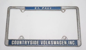 lot 131 image: Vintage St Paul Countryside Volkswagen, INC. License Plate Holder