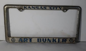 lot 132 image: Vintage Kansas City Art Bunker License Plate Holder