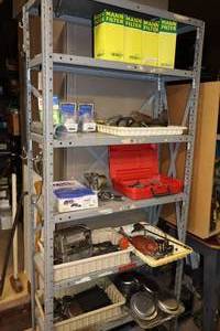 lot 155 image: Shelving Unit wContentsVolkswagen Vintage VW Parts & Pieces Etc.