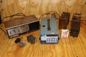 lot 198 image: Vintage Panasonic Radio, Met One Laser Particle Detector, Model AT Ford Coil Pack And More