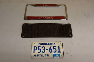 lot 221 image: License Plate Holder And Two Vintage License Plates
