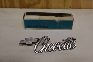 lot 234 image: 70-80s Chevette Fender Emblem And Chevrolet Door Lock And Keys