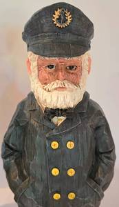 lot 35 image: Pair of Craggy Carved Wood Nautical Figures