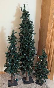lot 105 image: Three Decorative Faux Trees