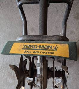 lot 125 image: Yard Man Gas Powered Tiller