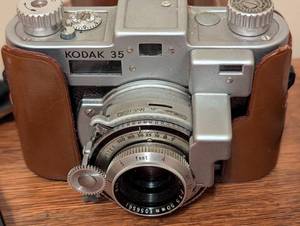 lot 136 image: Kodak 35mm Camera and Accessories