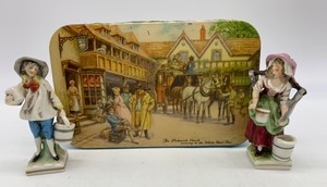 lot 161 image: Vintage Toffee Tin with 2 Mini Figurines (Man & Woman) Carrying Water Buckets