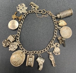 lot 122 image: Vintage Charm Bracelet - STERLING SILVER