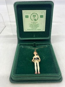 lot 126 image: Vintage MINNIE MARIA MINIATURES Articulated Pewter Ballerina Necklace - 112th Scale - NIB